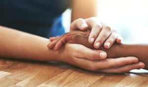 Supporting hands iStock-888343148